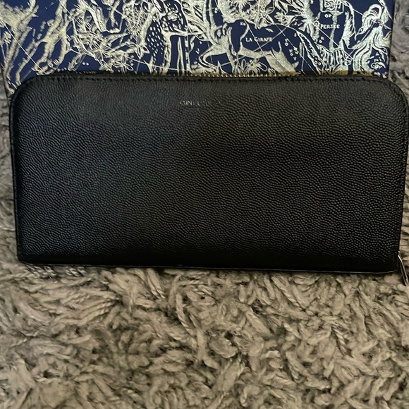 Used Saint Laurent Zippy Black Leather Wallet - Picture 1 of 10